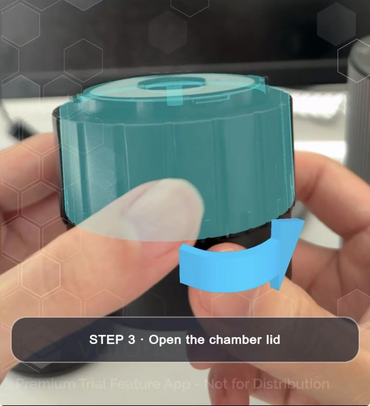 Component-level highlight and rotation cue attached to the coffee-maker chamber lid