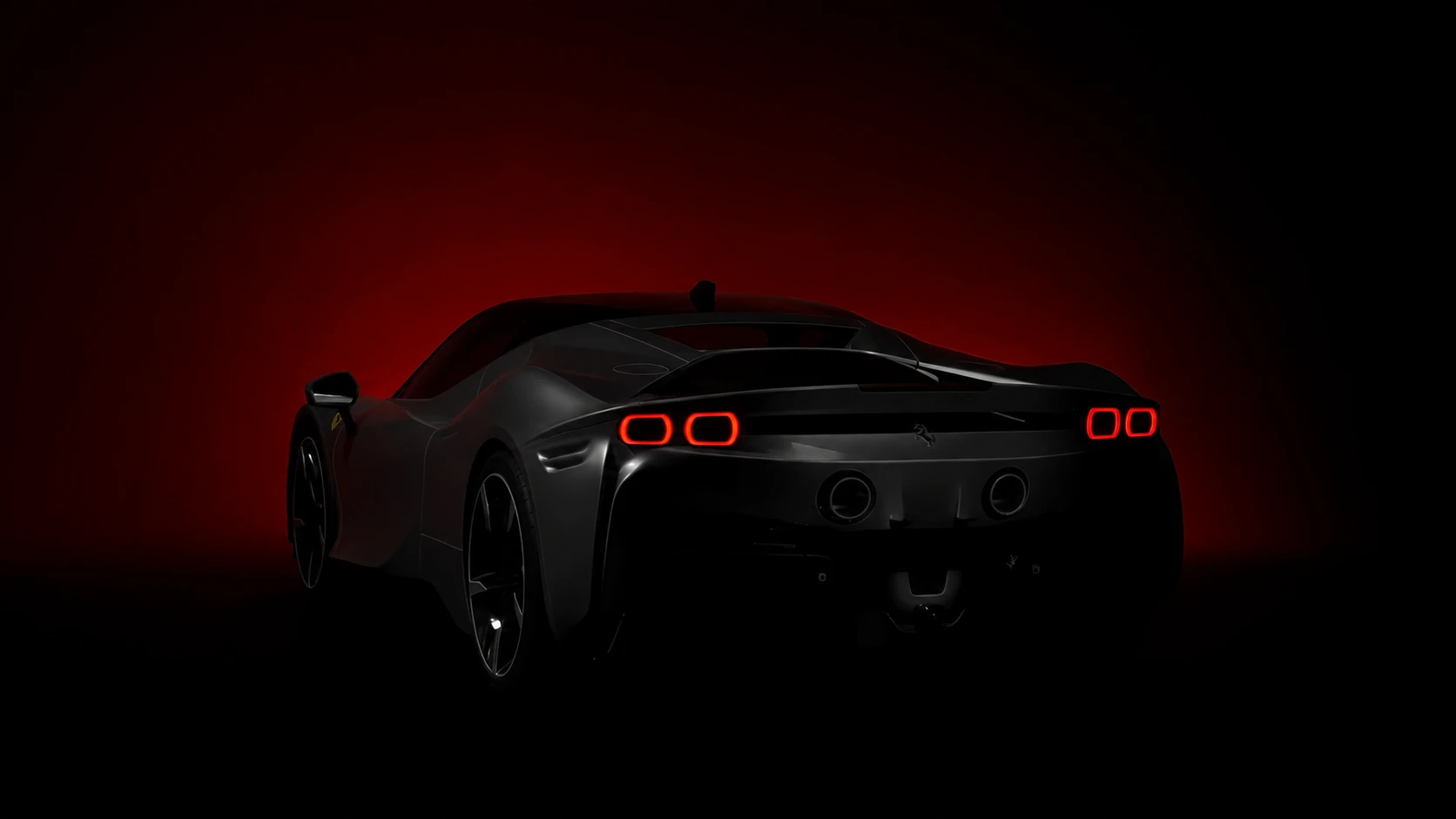 Rear silhouette of a Ferrari SF90 Stradale illuminated by red studio lighting